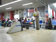 真剣な眼差しの佐藤支部長